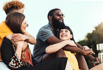 Image showing Couple, friends and hug with smile for summer vacation, travel or holiday break together in the outdoors. Diverse group of happy people relaxing, chilling or enjoying weekend getaway in nature