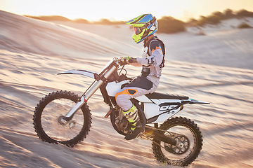 Image showing Motorcycle, athlete and sports outdoor with speed, fitness and riding in desert with extreme sport, fast and safety helmet. Challenge, power and biking exercise, person training and dirt bike rally