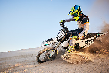Image showing Desert, moto cross or sports adventure athlete in sand for exercise, workout or speed. Travel, dirt and bike with energy of man in Dubai race on dirt with challenge and sport fitness with freedom