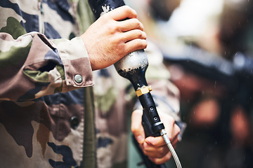 Image showing Closeup paintball gun, hands and man with camouflage clothes, ready and start for outdoor combat game. Weapon, war games and adventure for training, shooting and workout for tactical development