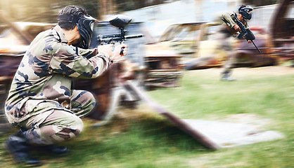 Image showing Paintball, army target and sport speed of a man doing workout and fitness for soldier training. Cardio, shooting and camouflage games of a young athlete with energy and cardio for outdoor sports game