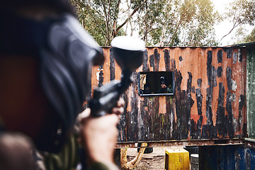 Image showing Paintball game, paint gun and men in war, competition or sports challenge outdoor for target shooting. Military, soldier or army men doing teawork training mission in woods with people or friends