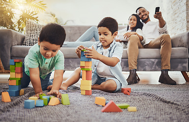 Image showing Building blocks, family or children learning for development growth with mother and father relaxing watching tv. Education, siblings or young boys playing fun toys or games for kids at home together