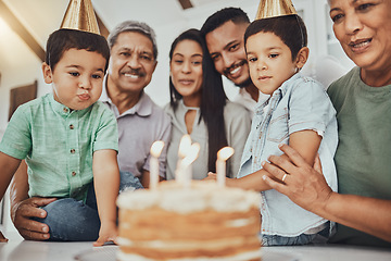 Image showing Birthday, family and children with parents and grandparents in a kitchen for cake, celebration and bonding. Party and kids with mother and father, happy and smile with grandmother and grandpa