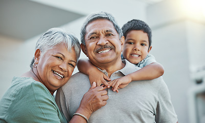 Image showing Grandpa, grandma and child hug with smile for happy holiday or weekend break with grandparents at the house. Portrait of elderly people holding grandchild on back for fun playful summer together