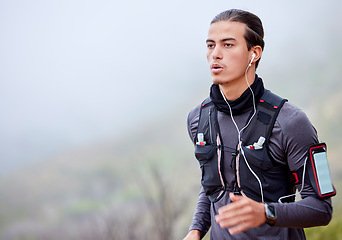 Image showing Man, runner and exercise for training, outdoor or workout for health, wellness or morning routine. Headphones, male or athlete with sportswear, equipment for tracking or monitor heart rate and mockup