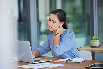 Image showing Stress, neck pain and business woman on laptop at office desk with joint injury risk. Tired worker, burnout and body fatigue while working on computer with anxiety, muscle problem or poor posture