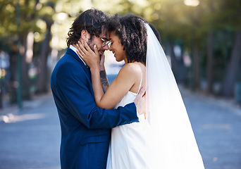 Image showing Wedding, couple and love outdoor for marriage celebration event together with commitment. Happy interracial man and woman at park with trust, partnership and smile while touching face with care