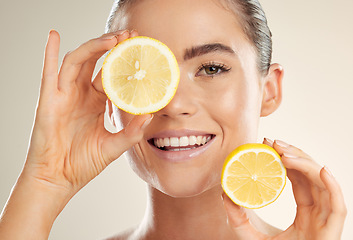 Image showing Beauty, face portrait and happy woman with lemon for natural fruit detox, health wellness or facial skincare glow. Spa salon, dermatology healthcare and nutritionist model with vitamin c food product