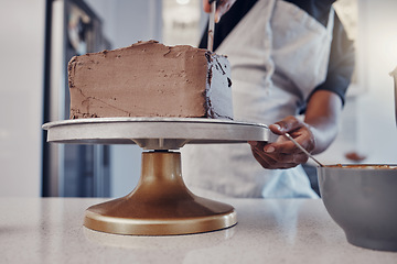 Image showing Hand, cake and cooking with a man chef working in a kitchen while preparing dessert for a party celebration. Food, chocolate and cherries with a male at work in a bakery to make gourmet confectionary