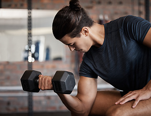 Image showing Fitness, bicep and dumbbell with a sports man training in a gym for strong or healthy muscles. Happy. exercise and weightlifting with a male athlete or bodybuilder in a health club for a workout