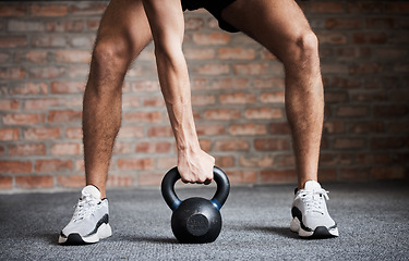 Image showing Kettlebell training, exercise and man hands for weightlifting, fitness workout and sports challenge in gym. Closeup of athlete, body builder and holding heavy weights for wellness, muscle and power