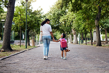 Image showing Walking, park and mother holding hands with girl on journey for back to school, learning and class for first day. Love, black family and mom with child walk for kindergarten, education and play date