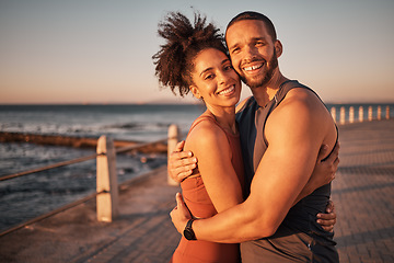 Image showing Fitness, love and portrait with couple and hug at beach for workout, exercise and health partner. Wellness, sunset and smile with man and woman training for, running, marathon and cardio endurance