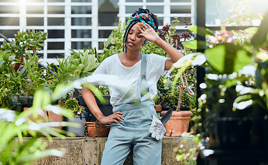 Image showing Tired, gardening or black woman with fatigue, stress or burnout after working on plants or flowers. Struggle, sweating or exhausted girl frustrated with cleaning or environmental maintenance