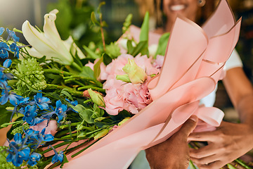 Image showing Bouquet, spring and woman with flowers for a present at a shop for growth, gift or gardening. Floral, entrepreneurship and florist with plants, nature and ecology working at a small business