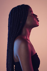 Image showing Calm, beauty and profile of black woman in studio with braids, makeup and cosmetic routine. Relax, cosmetics and African female model with relaxing, peace and zen mindset isolated by pink background.