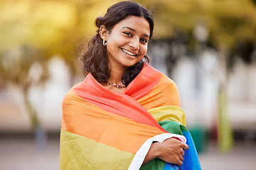 Image showing Love, nature and portrait of woman in pride flag, smile and non binary lifestyle of freedom, peace and equality in Brazil. Rainbow, park and summer, happy girl in gay and lgbt community protest.