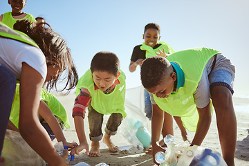 Image showing Beach, recycle and group of children cleaning the environment for volunteer, charity or ngo support, help and teamwork. Diversity friends or students recycling plastic for pollution or earth day