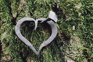 Image showing forged heart and nail love concept