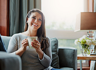 Image showing Coffee, woman and smile of a relax person at home on a living room sofa relaxing in the morning. Thinking, happy female and lens flare on a lounge house couch with tea feeling happiness with a mug