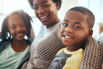 Image showing Love, portrait of mother and children bonding on sofa for happy family time together in apartment in South Africa. Smile, trust and support, black woman and kids on couch with healthy relationship.