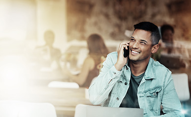 Image showing Creative man, phone and smile for communication, networking or conversation at coffee shop. Happy male freelancer smiling for call, discussion or startup with smartphone by laptop at cafe restaurant