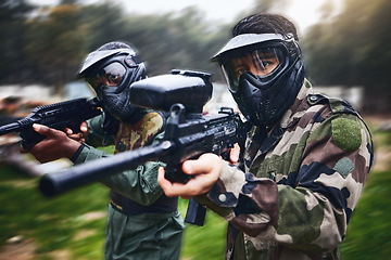 Image showing Training, paintball gun and men in camouflage with safety gear at military game for target practice. Teamwork, shooting sports and war games, play with rifle and friends working together at army park