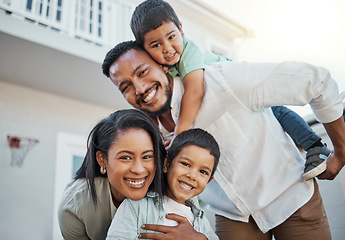 Image showing Portrait, happy family and piggyback outdoor at new home, real estate loan and building mortgage together. Parents, kids and smile outdoor for property investment, moving house and future security