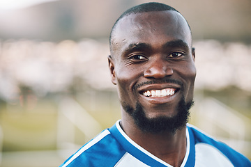 Image showing Sports, soccer and portrait of black man on field with smile on face and motivation for winning game in Africa. Confident, proud and happy professional football player at exercise or training match.