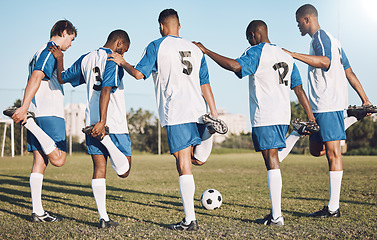 Image showing Soccer, sports and stretching with a team outdoor on a field getting ready together for a competitive game. Football, fitness and warm up with a male sport group of friends on a pitch before a match