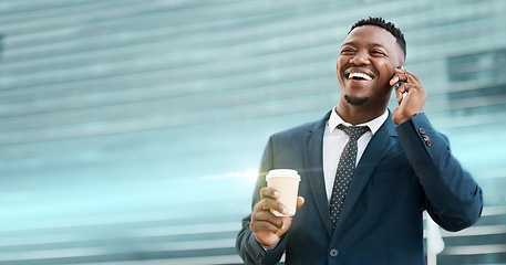 Image showing Phone call, coffee and businessman happy, smile and confident against a building background. Black guy, entrepreneur and smartphone networking, conversation and call with good news while in a city