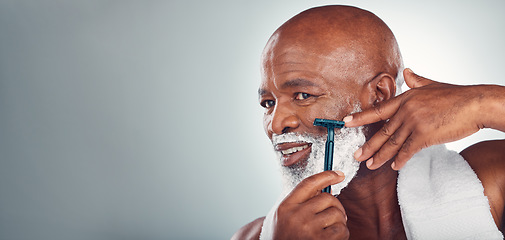 Image showing Black man, beard and shaving face in skincare for grooming, self care or facial treatment on mockup. African American male smiling for clean hygiene, shave and cream with razor on a gray background