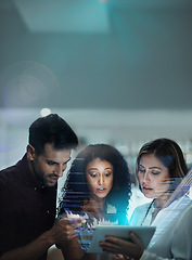 Image showing Tech hologram, futuristic overlay and tablet with statistics and investment team planning. Finance hologram, analytics and information technology with employee group working on collaboration