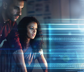 Image showing Woman, businessman and computer in night for overlay, futuristic hologram or teamwork for coding strategy. Team, dark office and with holographic tech abstract for focus, pc or information technology