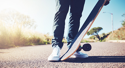 Image showing Skateboard, road and person feet in sports training, learning or outdoor hobby in summer. Asphalt street, park and skater in skating activity, cardio or fitness with gen z, urban lifestyle or travel