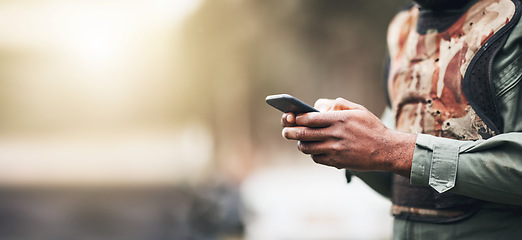 Image showing Social media, chat and hands of a man with a phone in nature for communication and 5g connection. Mockup, space and person typing on a mobile for conversation, internet and research on the web