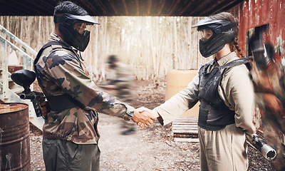 Image showing Handshake, paintball team and congratulations or support, sports game on battlefield and partnership with agreement. Mask for safety, speed and gun, people together on shooting range with trust