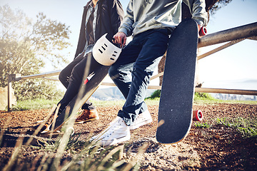 Image showing Skateboard, sports and legs of friends in park ready for adventure, freedom and enjoying hobby together. Friendship, fitness and skater men with longboard for exercise, skating and training outdoors
