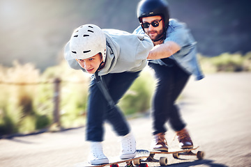 Image showing Skating, longboard and friends riding fast on a road, racing downhill with skateboard and helmet for safety. Extreme sports, speed and people or skateboarder in action on mountain pass