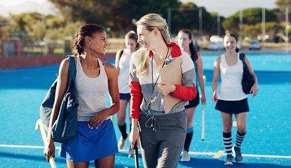 Image showing Team leader, hockey and happy discussion with player for coaching, teamwork or collaboration in the outdoors. Fitness sporting coach talking with athlete in friendly conversation for training tips
