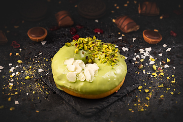 Image showing Donut in green glaze