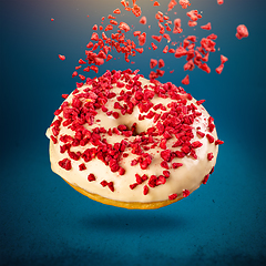 Image showing Flying donut with icing