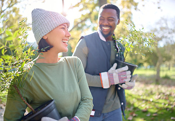 Image showing Friends, agriculture and people on a farm happy and holding a plant for growth as sustainability in the environment. Woman, black man and farmer excited for planting in the countryside in nature