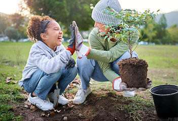 Image showing High five, child and woman with plant for gardening at park with trees in nature garden environment. Happy volunteer family planting for growth, ecology and sustainability for community on Earth day