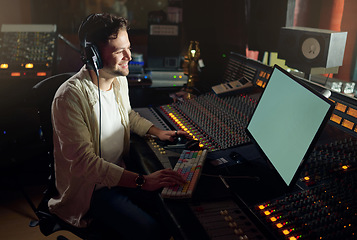 Image showing Producer, smile or computer headphones in music recording, sound mixing or song composition in studio. Musician, DJ or happy man on technology and ideas for live streaming radio, audio or media album