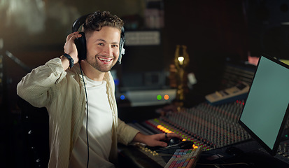 Image showing Portrait, smile or musician on recording headphones in sound engineering, edm song composition or production studio. DJ, happy man or producer technology in live streaming radio, audio or media album