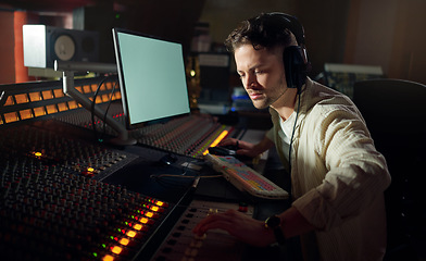 Image showing Man, thinking or recording headphones for music, sound mixing or computer song composition in studio. Musician, DJ or producer on technology with ideas for live streaming radio, audio or media album