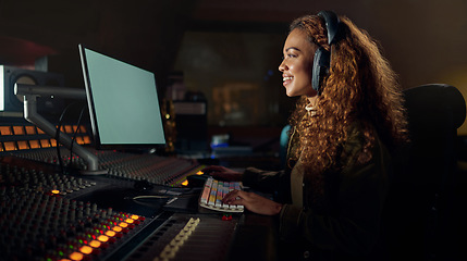 Image showing Woman, smile or recording headphones in music, sound mixing or computer song composition in studio. Producer, DJ or happy musician on technology ideas for live streaming radio, audio or media album