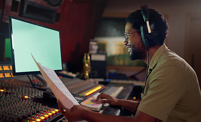 Image showing Man, happy or music sheets in recording, sound engineering or song composition studio. Producer, singer or smile musician with headphones on technology mockup for radio, audio or media album mixing